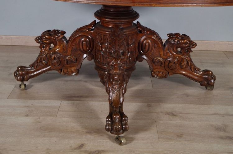 Large Renaissance-style carved oak pedestal table, circa 1900