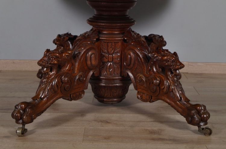 Large Renaissance-style carved oak pedestal table, circa 1900