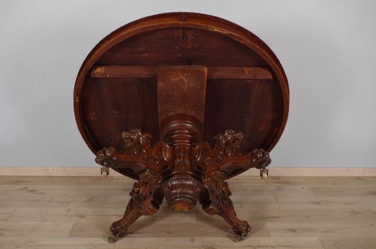 Large Renaissance-style carved oak pedestal table, circa 1900