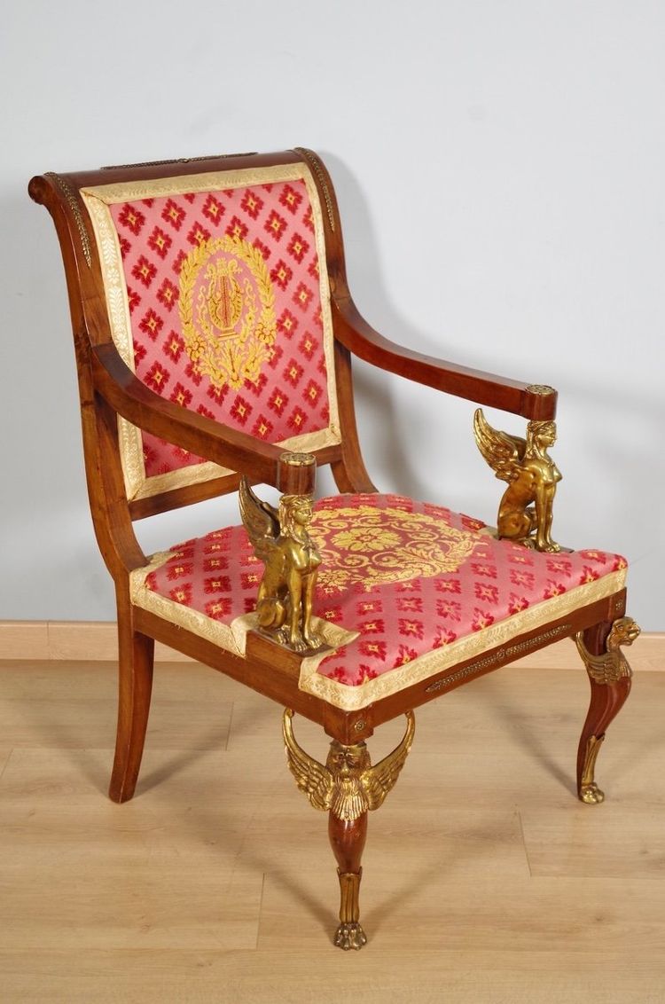 Pair of "Return from Egypt" armchairs in mahogany and gilded bronze, circa 1900