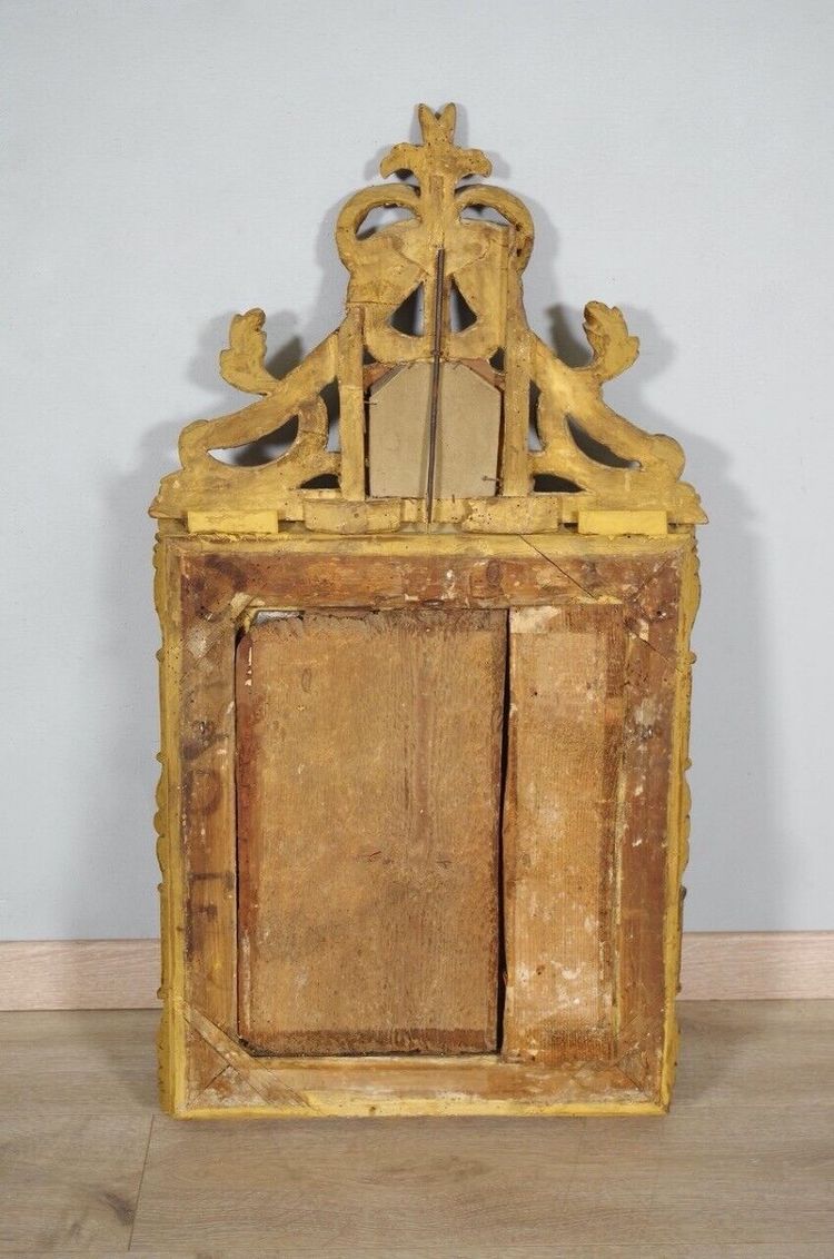 Miroir à parecloses Régence en bois doré, XVIIIe siècle
