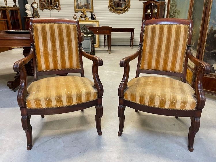 Pair of Restoration-style mahogany armchairs with curved backs, circa 1815