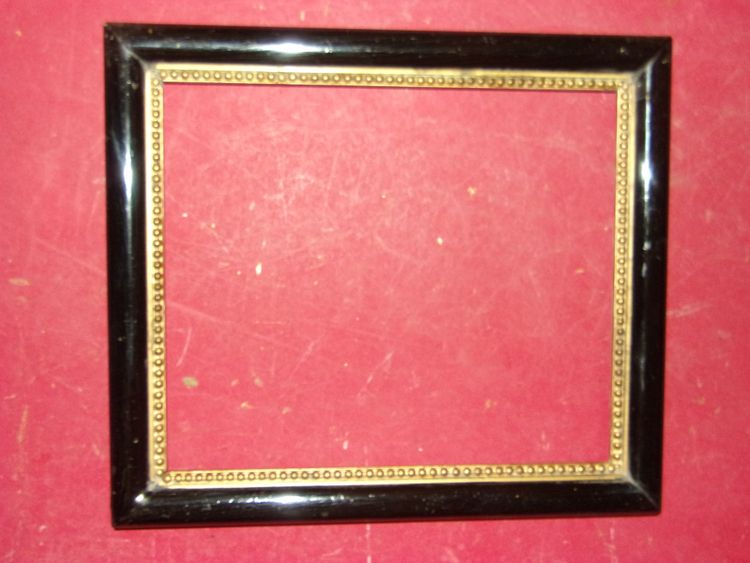 Pair of 19th-century frames, in gilt and black wood