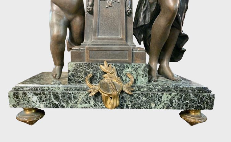 Louis XVI-style clock with a putto and a draped woman, circa 1880