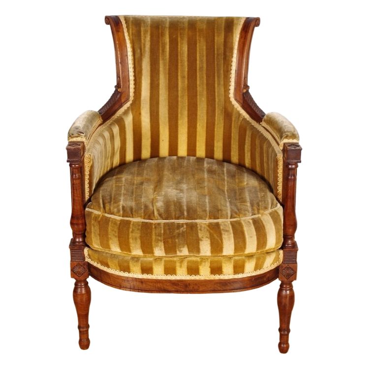 Bergère-Stuhl aus der Directoire-Zeit, aus geschnitztem Nussbaumholz, um 1795