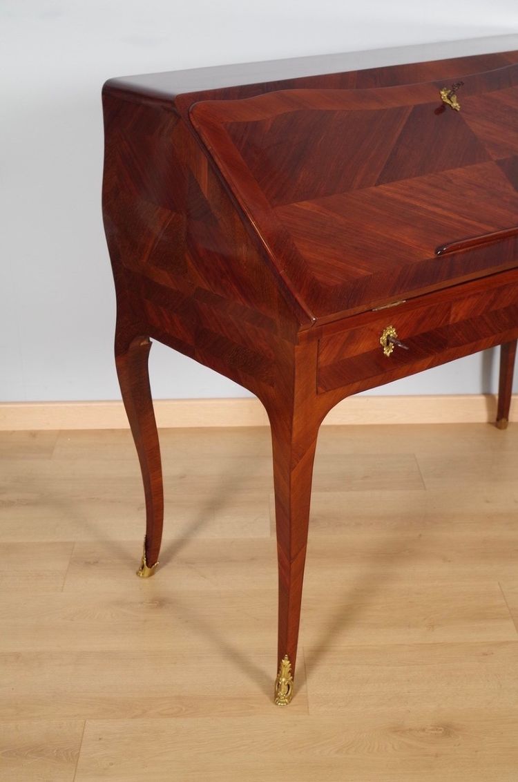 Bureau à pente Louis XV en placage d'amarante, vers 1750