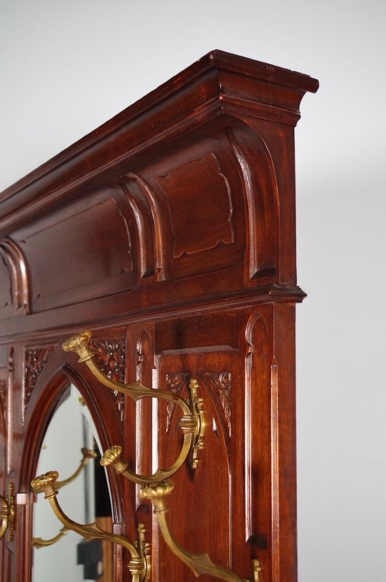 Gothic coat rack with mirror in carved walnut, circa 1900