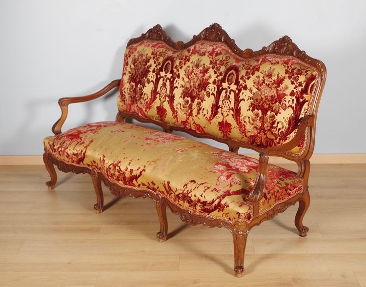 Large Regency sofa in carved walnut, circa 1900