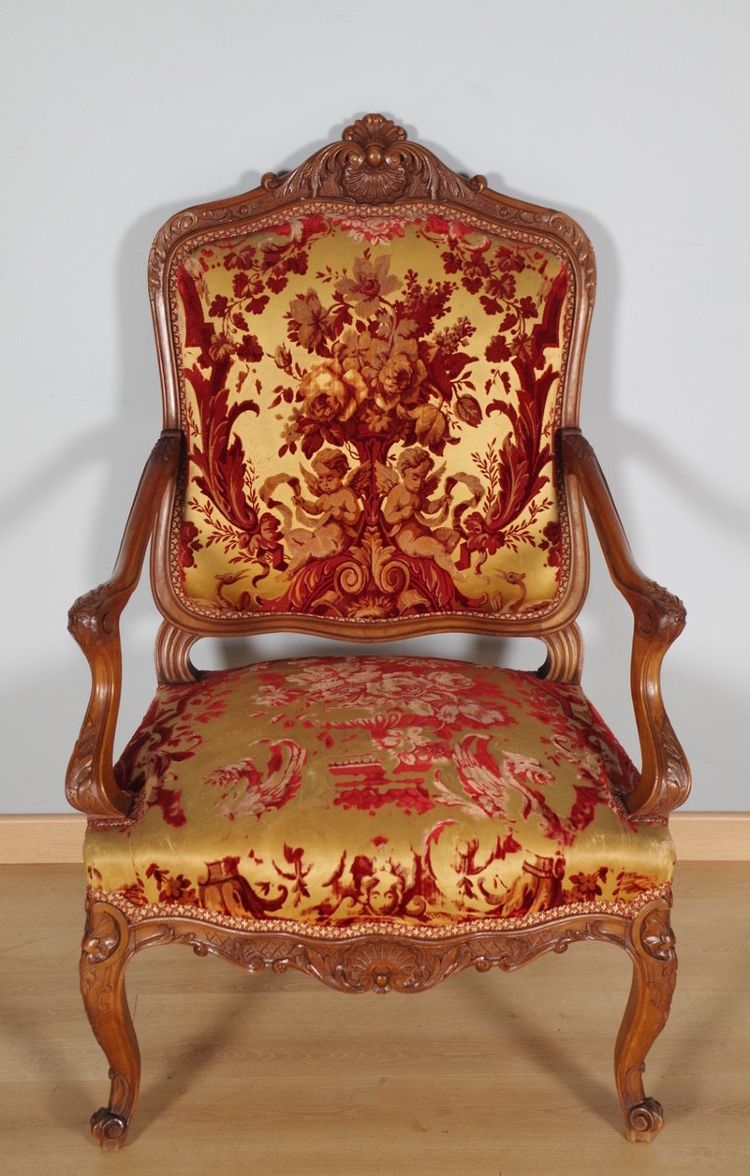 Pair of large Regency armchairs in carved walnut, circa 1900
