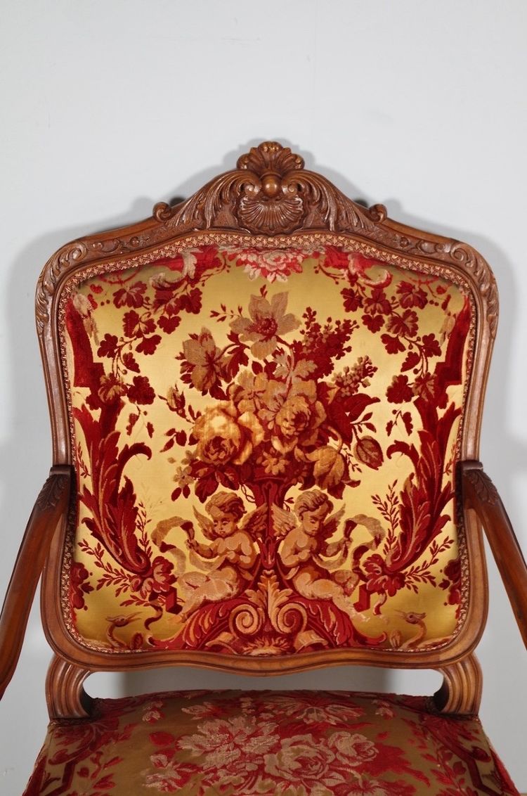 Pair of large Regency armchairs in carved walnut, circa 1900