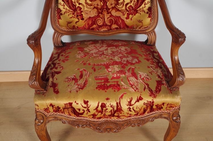 Pair of large Regency armchairs in carved walnut, circa 1900