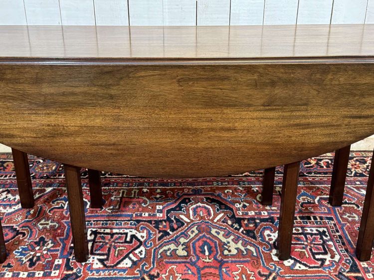 English drop-leaf mahogany table called Gateleg