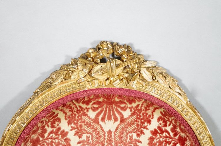 Set of four Louis XVI armchairs in giltwood with musical attributes, circa 1880