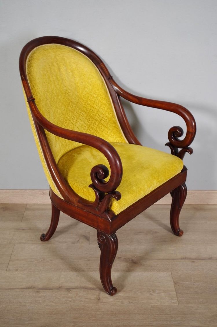 Pair of Charles X mahogany gondola armchairs, circa 1830