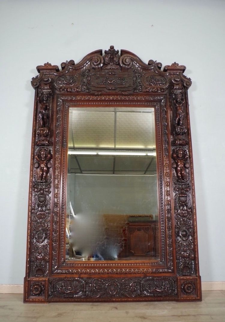Important miroir Renaissance en noyer sculpté, vers 1880
