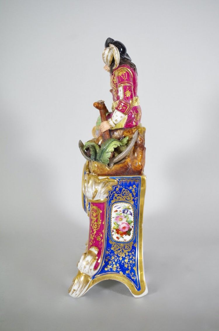 Porcelain clock with a buccaneer motif, in the style of Jacob Petit, circa 1830
