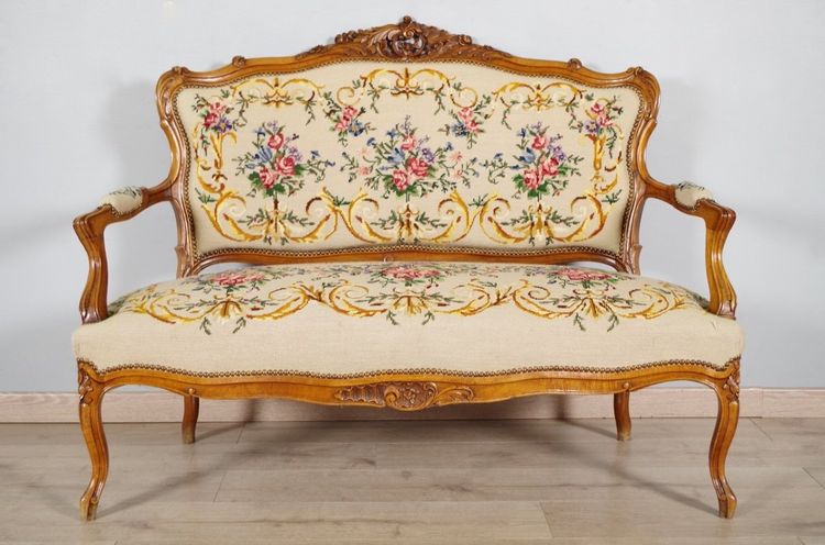 Louis XV style sofa in carved walnut and petit point tapestry, circa 1900