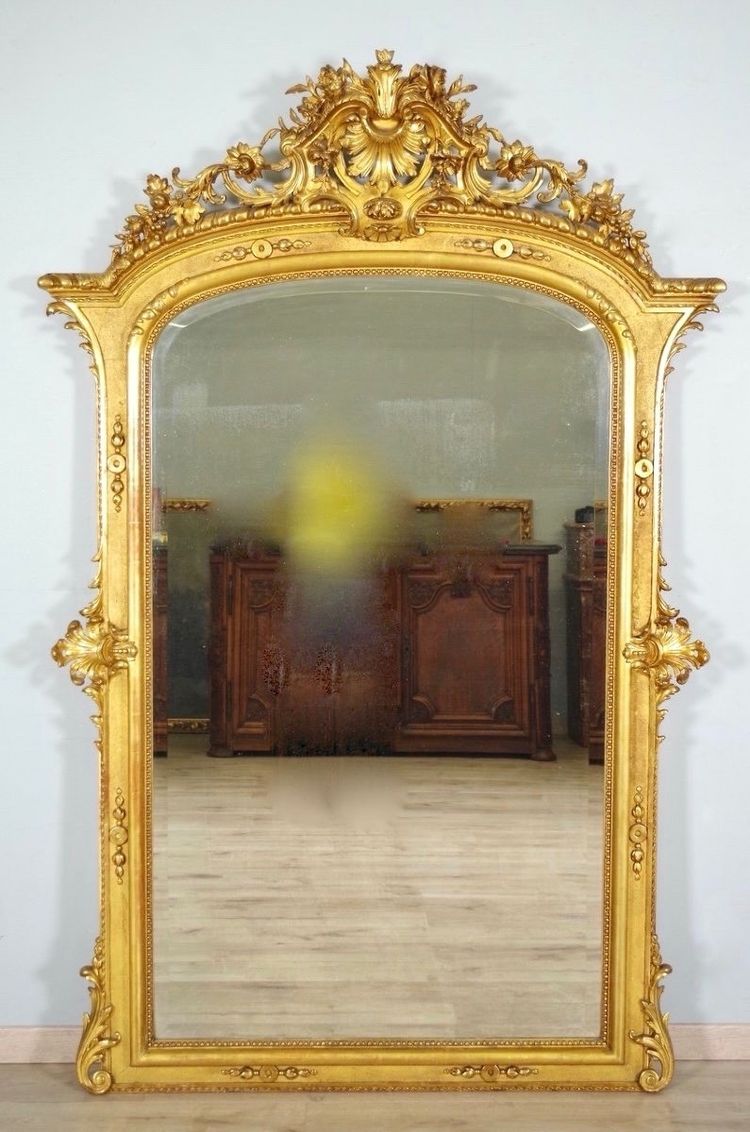 Important miroir Régence en bois et stuc dorés, vers 1880