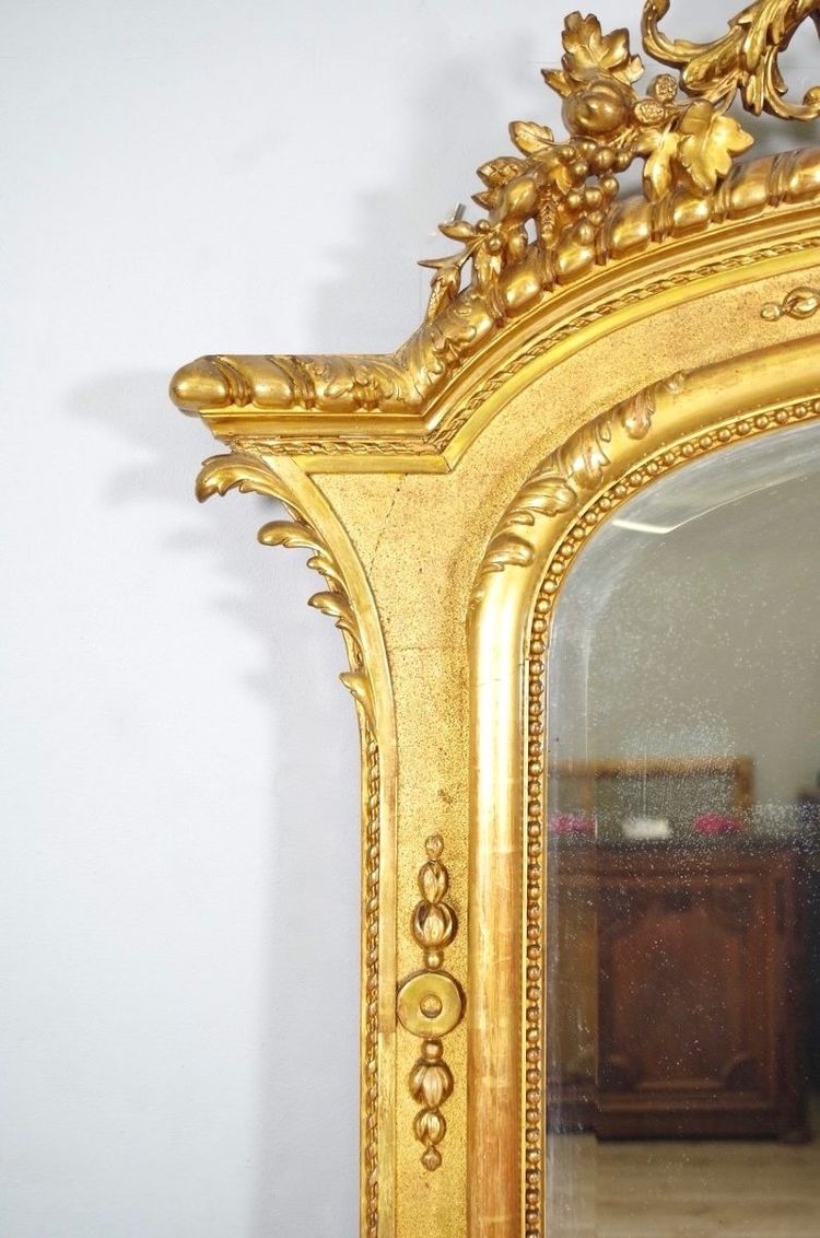 Important miroir Régence en bois et stuc dorés, vers 1880