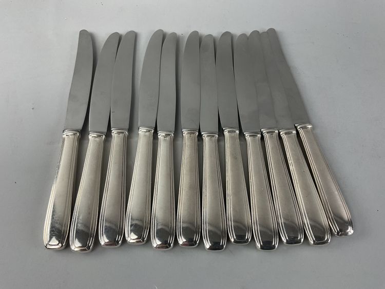 12 silver-plated table knives in Art Deco style
