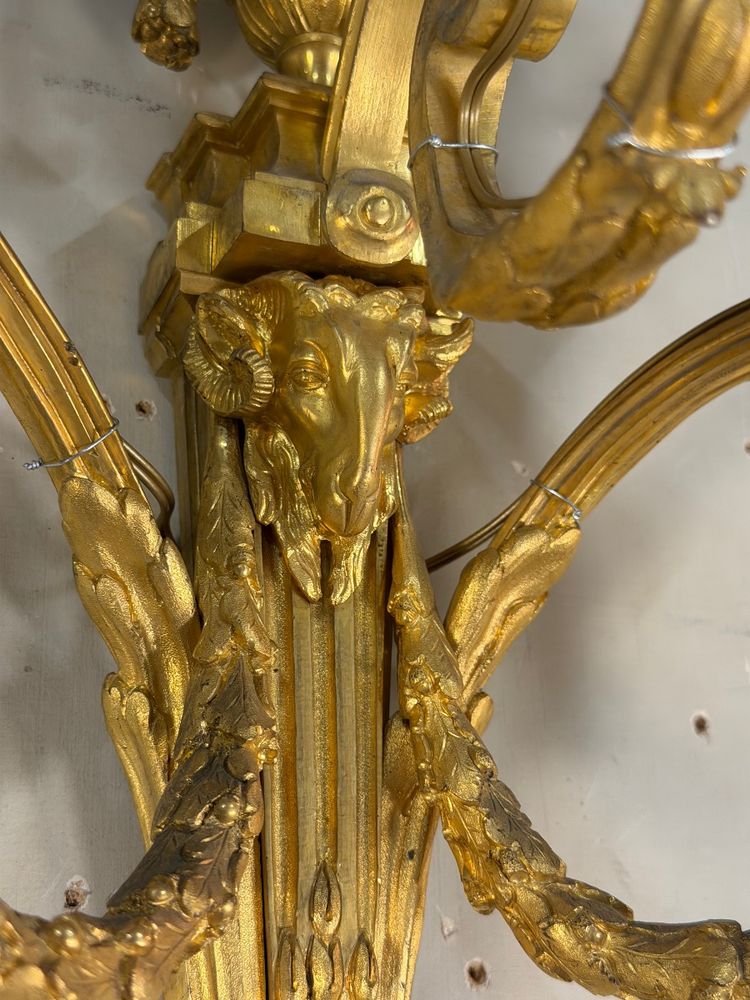 Pair of gilded bronze wall sconces in the Louis XVI style, circa 1880