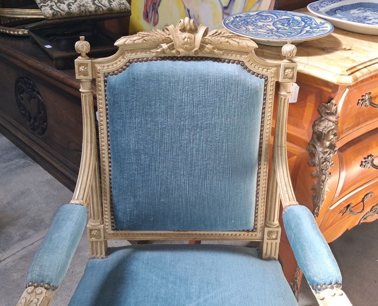 Louis XVI style armchair in lacquered wood, upholstered in blue velvet