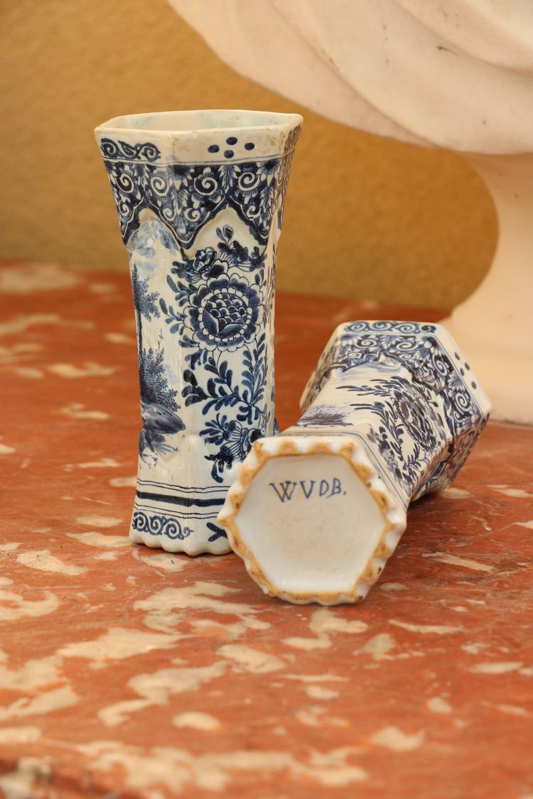 Set of four Delftware vases