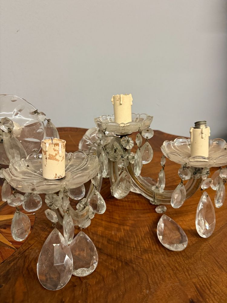 Three "Maria Teresa" three-light wall sconces, early 1900s, crystal, 18x30x20 cm. In good condition, complete.