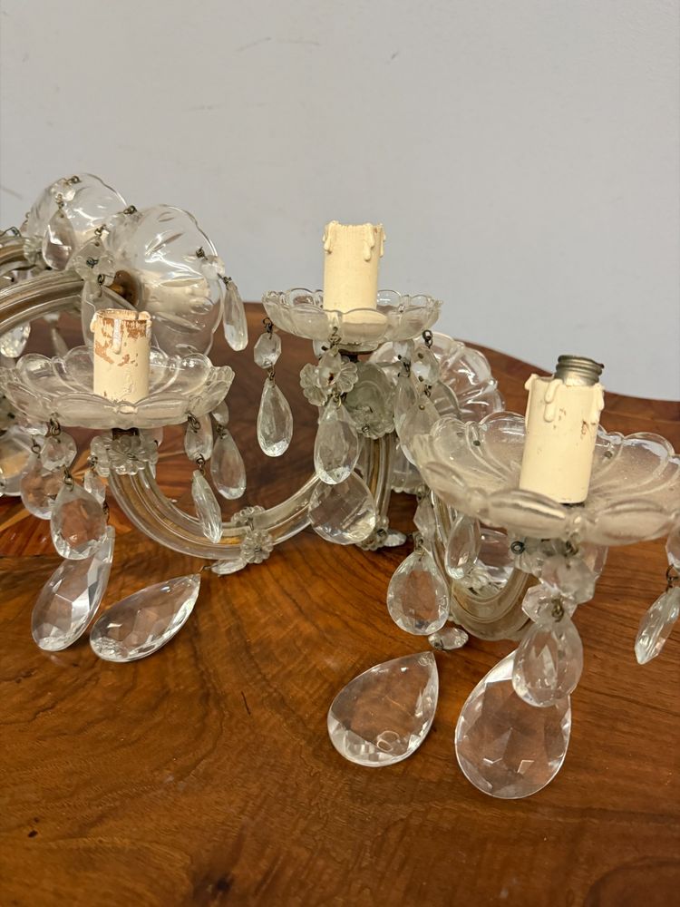 Three "Maria Teresa" three-light wall sconces, early 1900s, crystal, 18x30x20 cm. In good condition, complete.