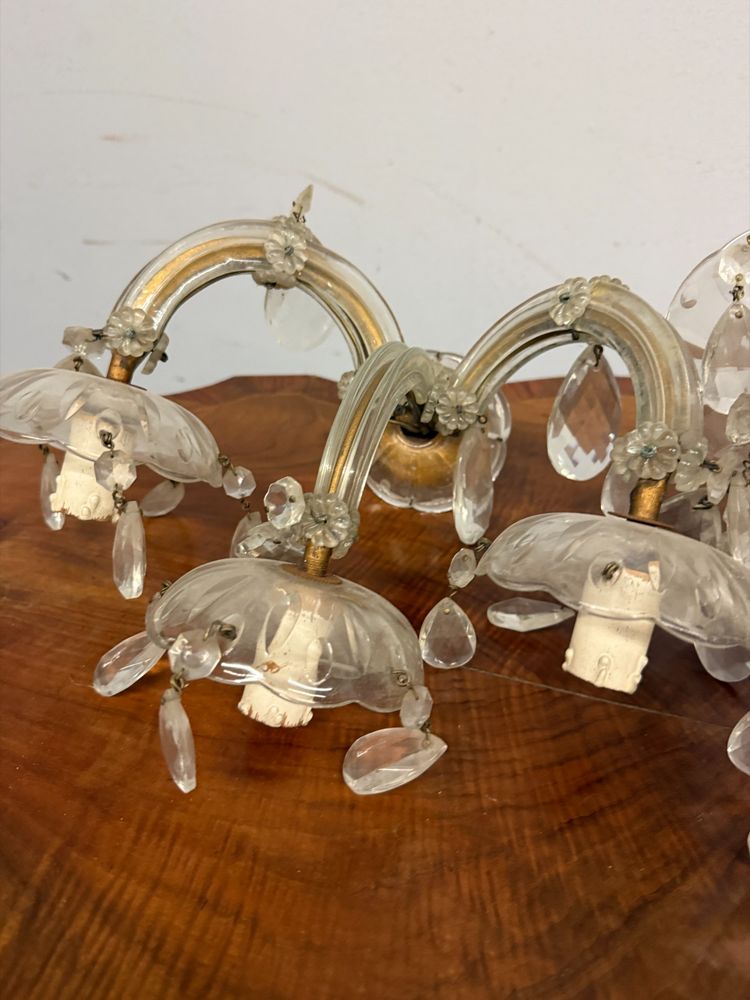Three "Maria Teresa" three-light wall sconces, early 1900s, crystal, 18x30x20 cm. In good condition, complete.