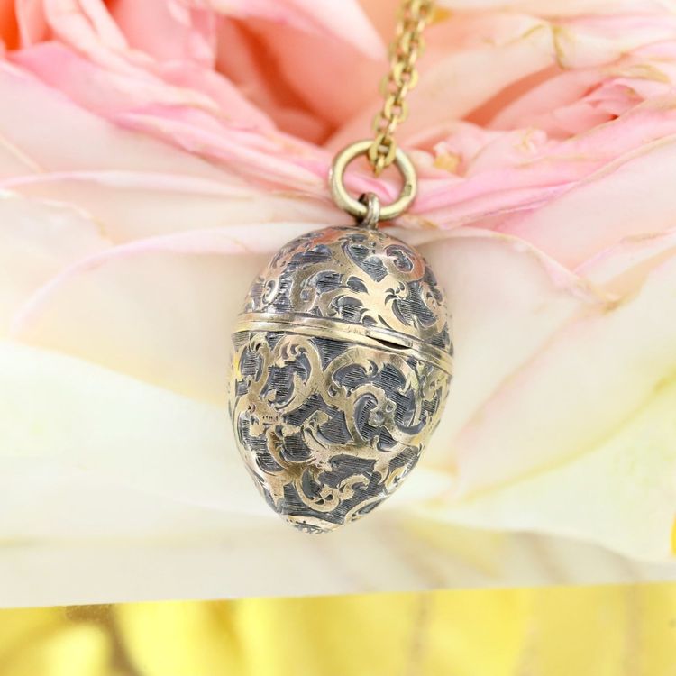 Pendentif œuf ouvrant argent et vermeil
