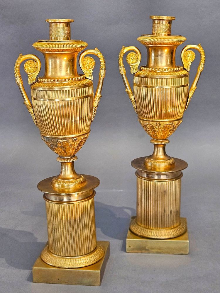 pair of reversible gilded bronze cassolettes/candleholders—Empire period