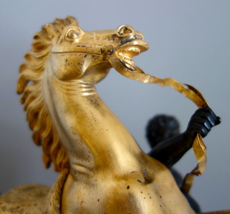 Cheval de Marly groupe en bronze patiné et doré au mercure d'époque Restauration début XIXe siècle