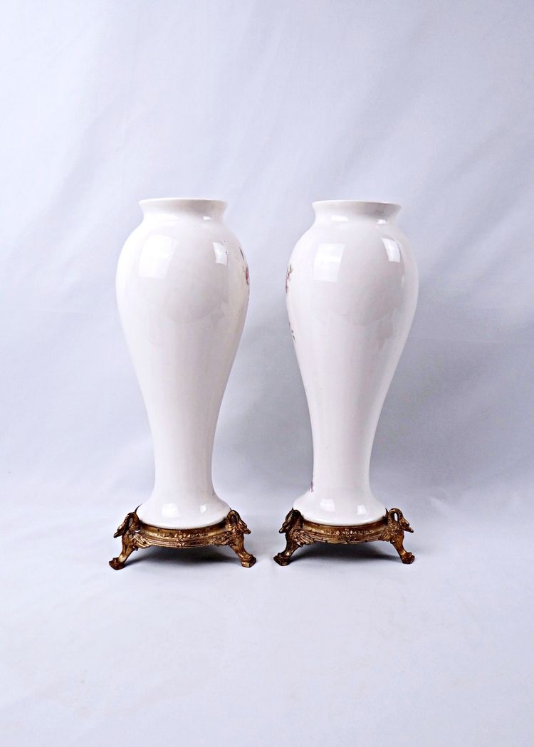 Pair of Limoges porcelain vases with floral decoration and gilded bronze mounts, late 19th century