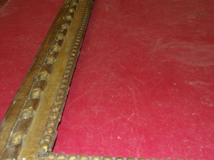 18th-century Louis XVI giltwood frame.