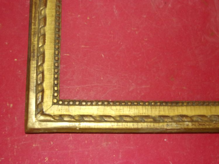 18th-century Louis XVI giltwood frame.
