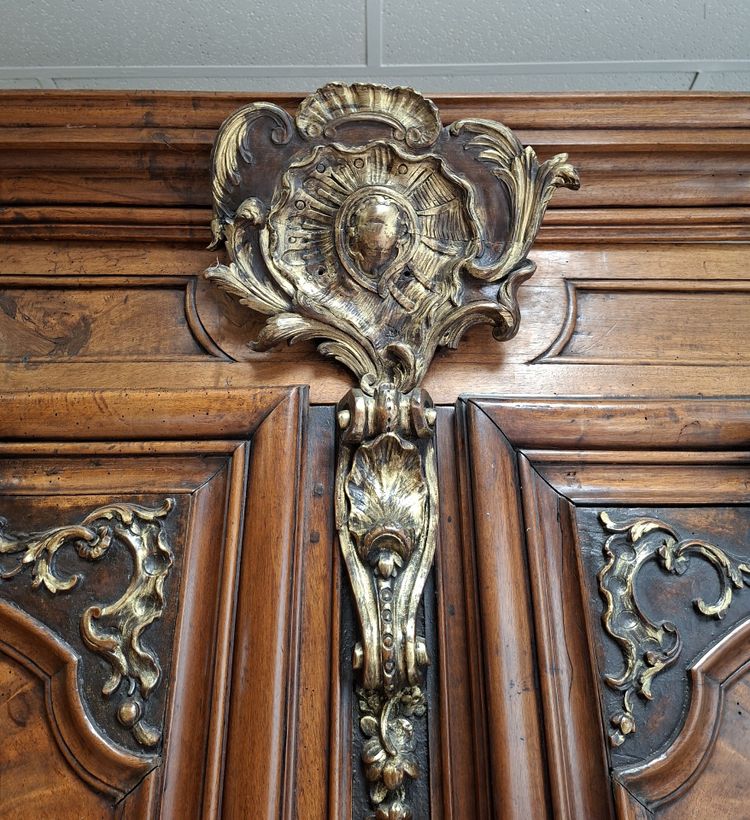 Richly molded and inlaid Louis XIV walnut cabinet – 18th century