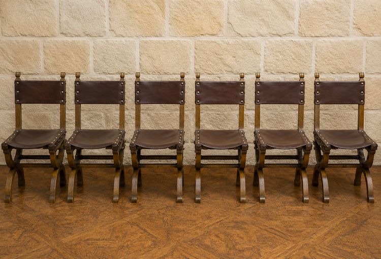 Set of six Renaissance-style chairs made of oak and leather