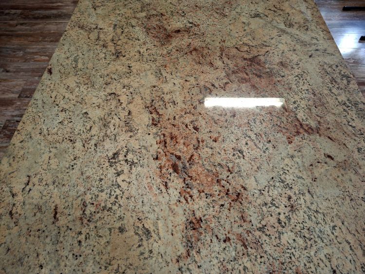 Large dining table made of polished granite with an oak and wrought-iron base 
