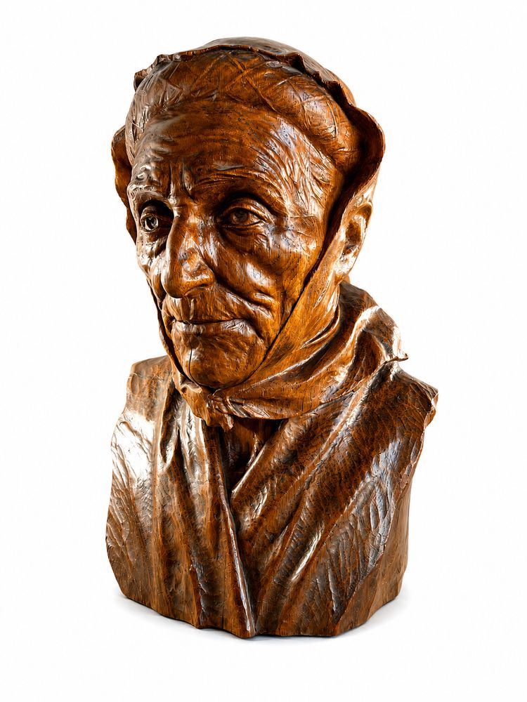 Buste sculpté en bois massif « Vieille paysanne » signé Léon Monce, daté 1912
