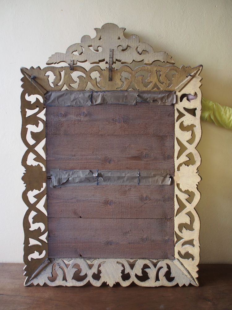 Miroir style renaissance en bois doré