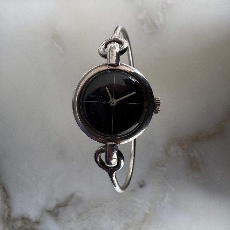 Montre Reglex en argent bracelet rigide