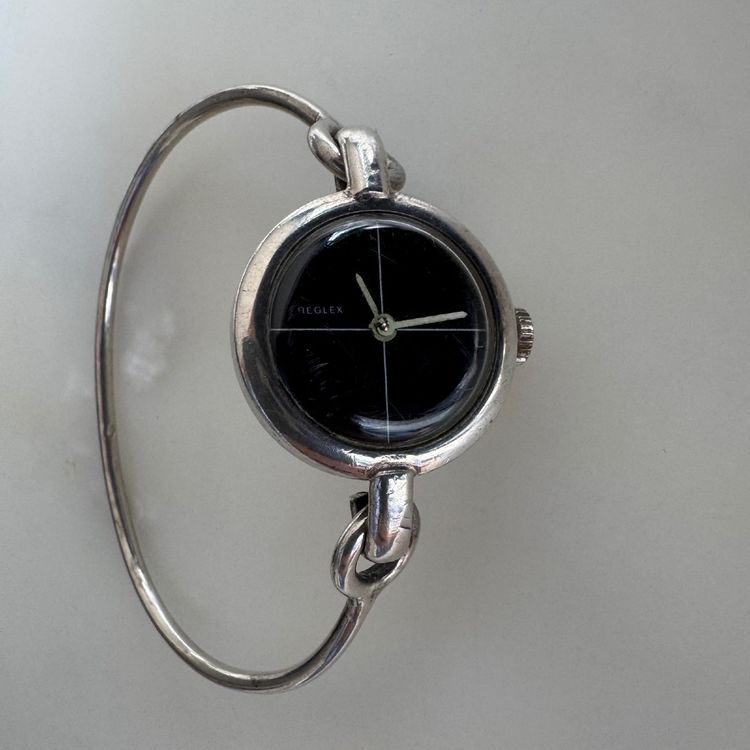 Montre Reglex en argent bracelet rigide