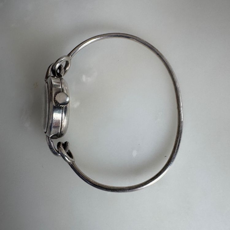 Montre Reglex en argent bracelet rigide
