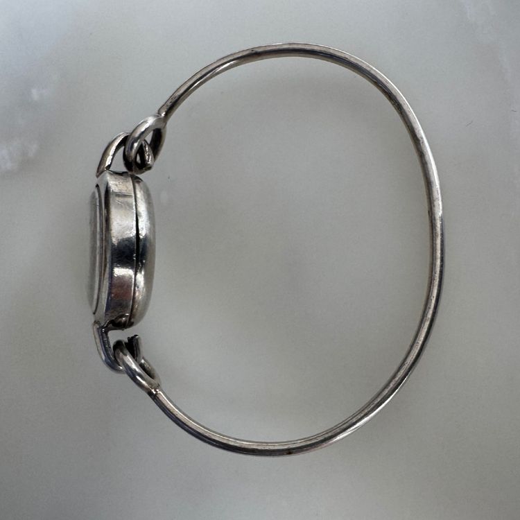 Montre Reglex en argent bracelet rigide