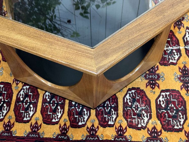 Octagonal GPlan side table from the 1970s in teak with a glass top