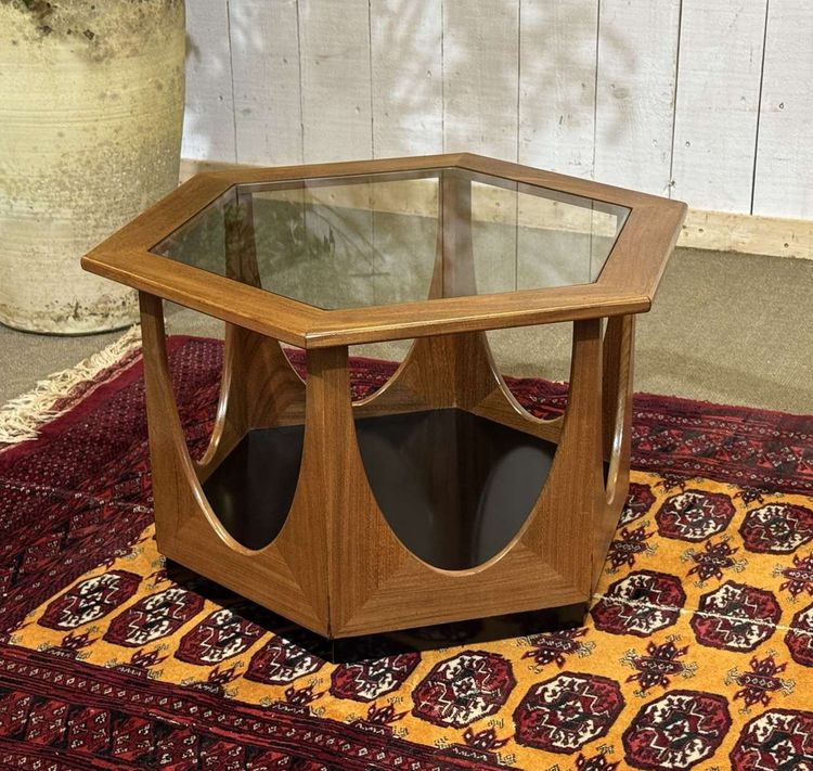 Octagonal GPlan side table from the 1970s in teak with a glass top