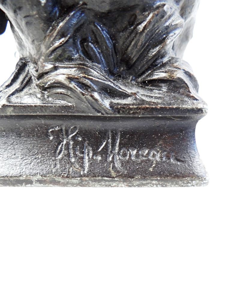 "The Child and the Lizard," a statuette in regul, with a brown patina, signed by Hyppolite Moreau, 19th century
