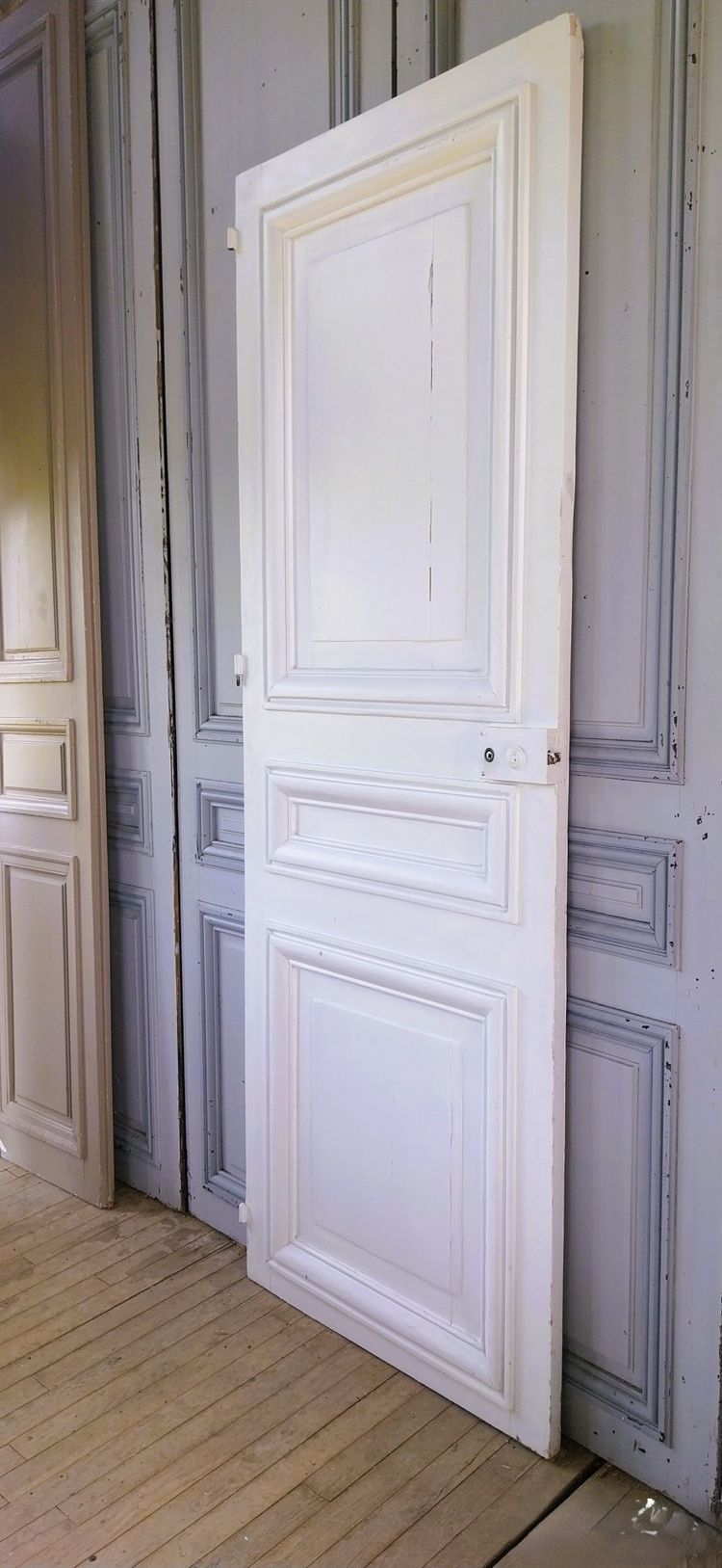 Historic Haussmann-style door with its original frame