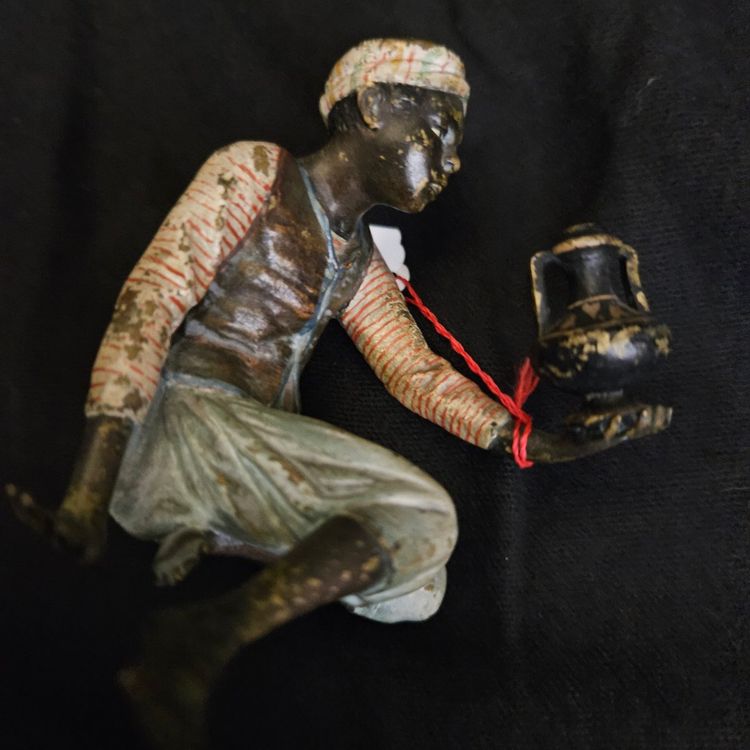Vienna bronze. Seated Orientalist figure holding a lantern